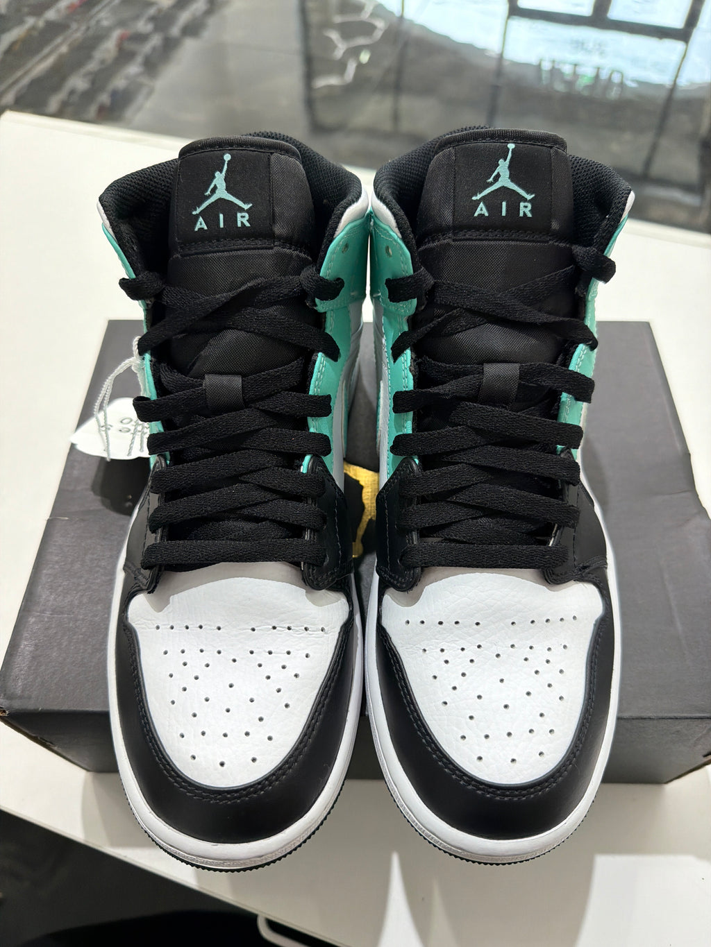 Jordan 1 Mid tropical twist