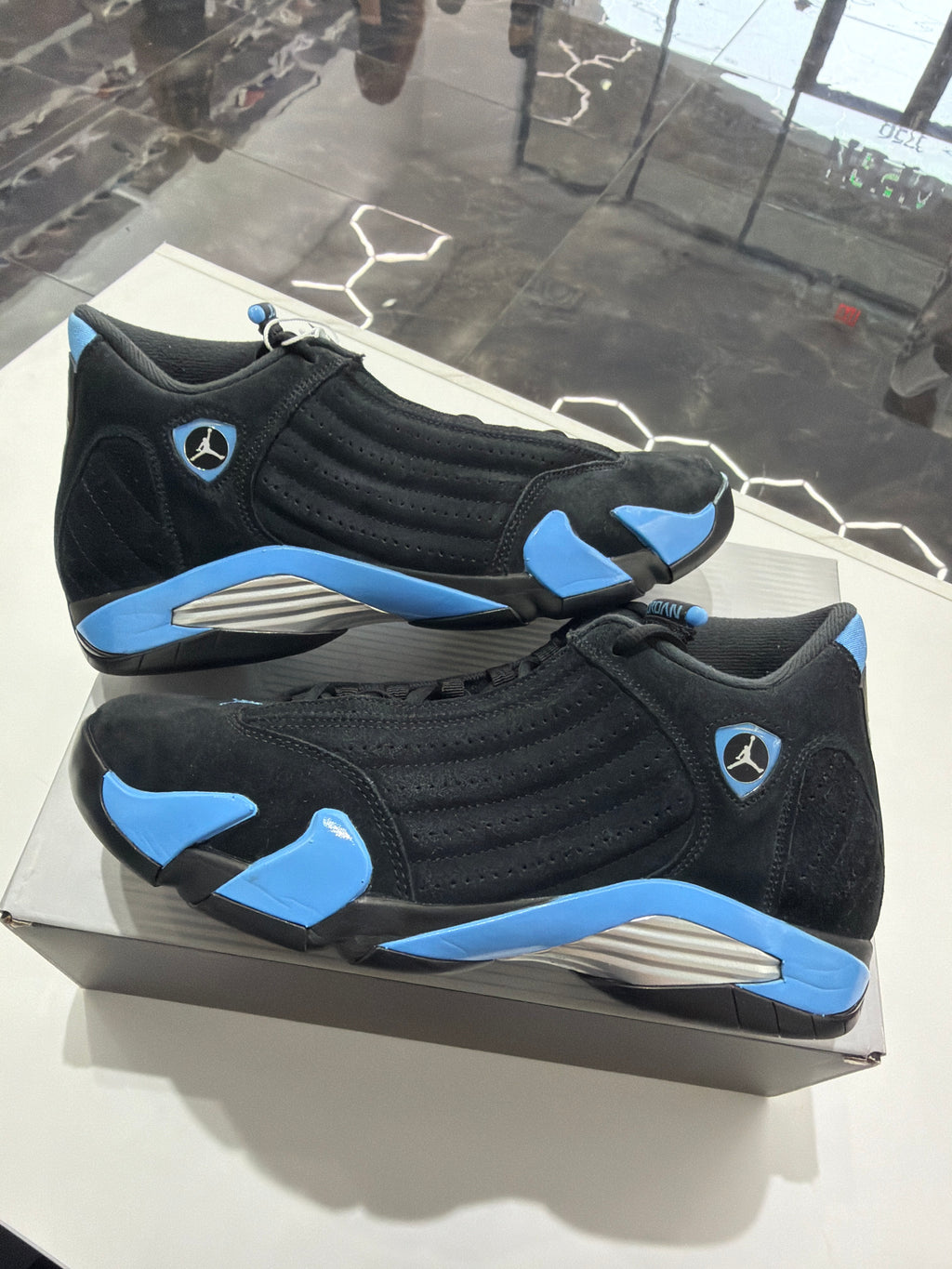 Jordan 14 black unc blue