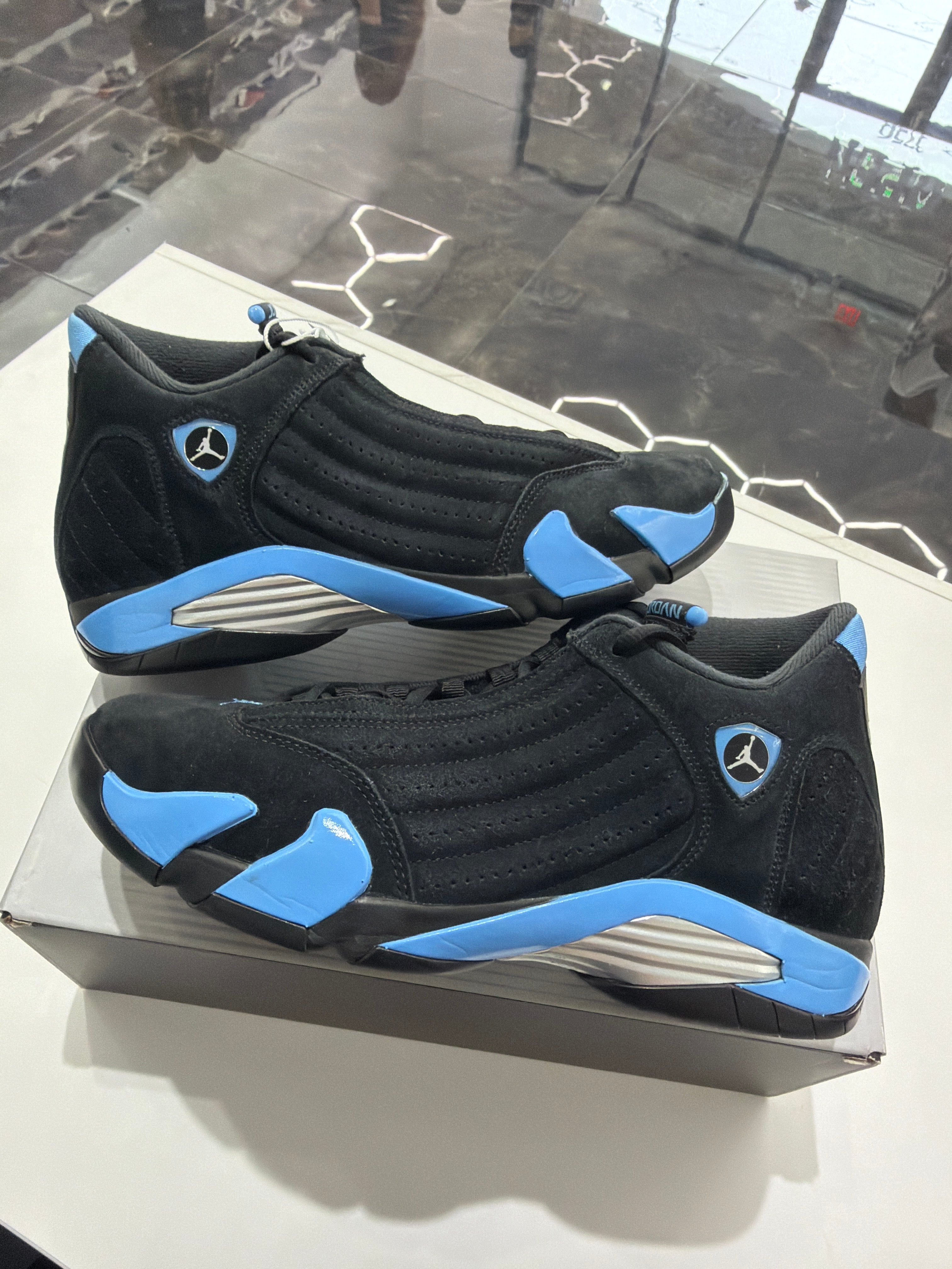 Jordan 14 black unc blue