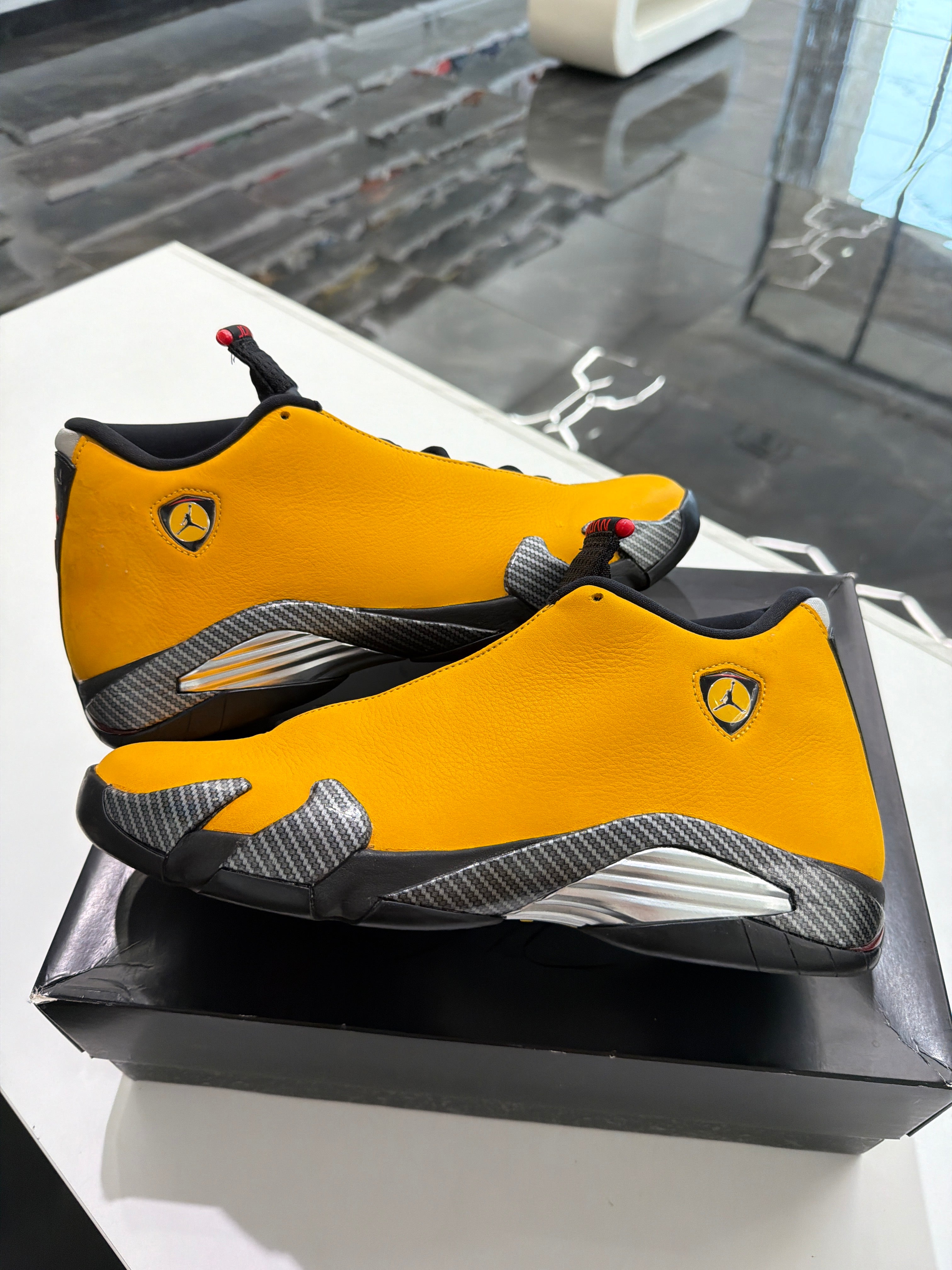 Jordan 14 university gold