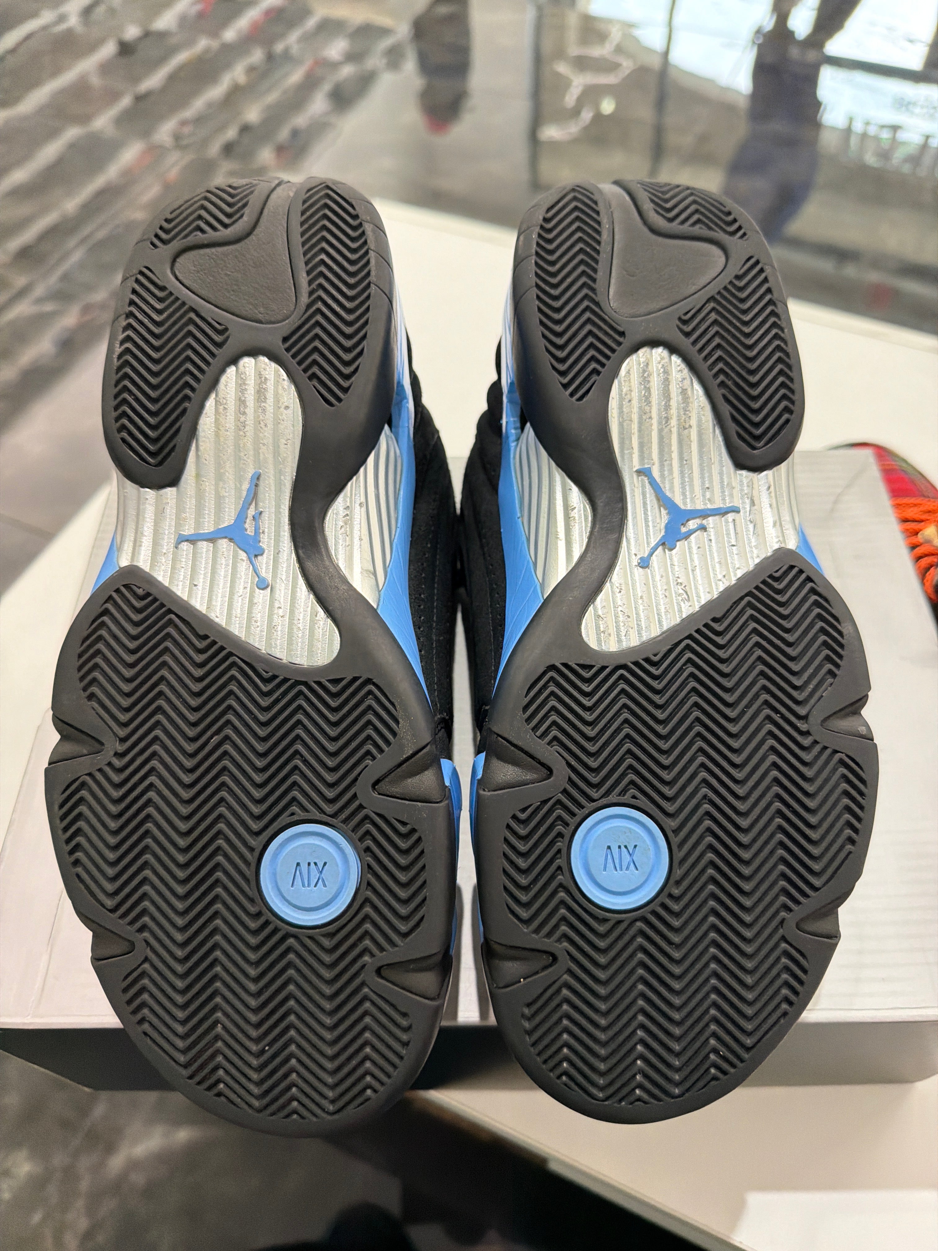 Jordan 14 retro black unc blue