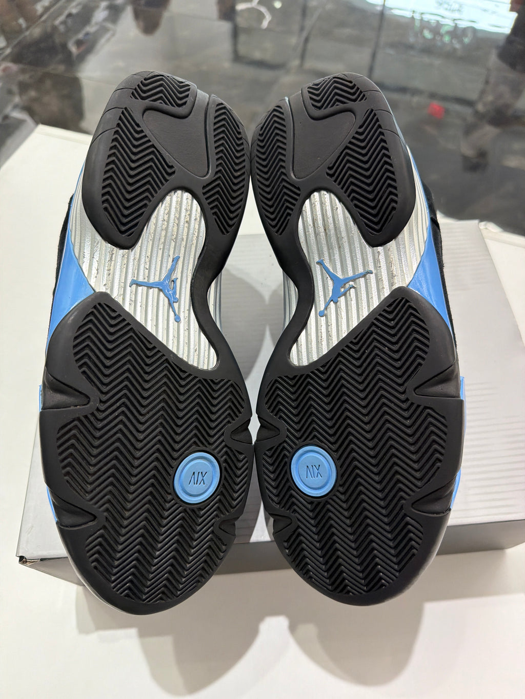 Jordan 14 black unc blue