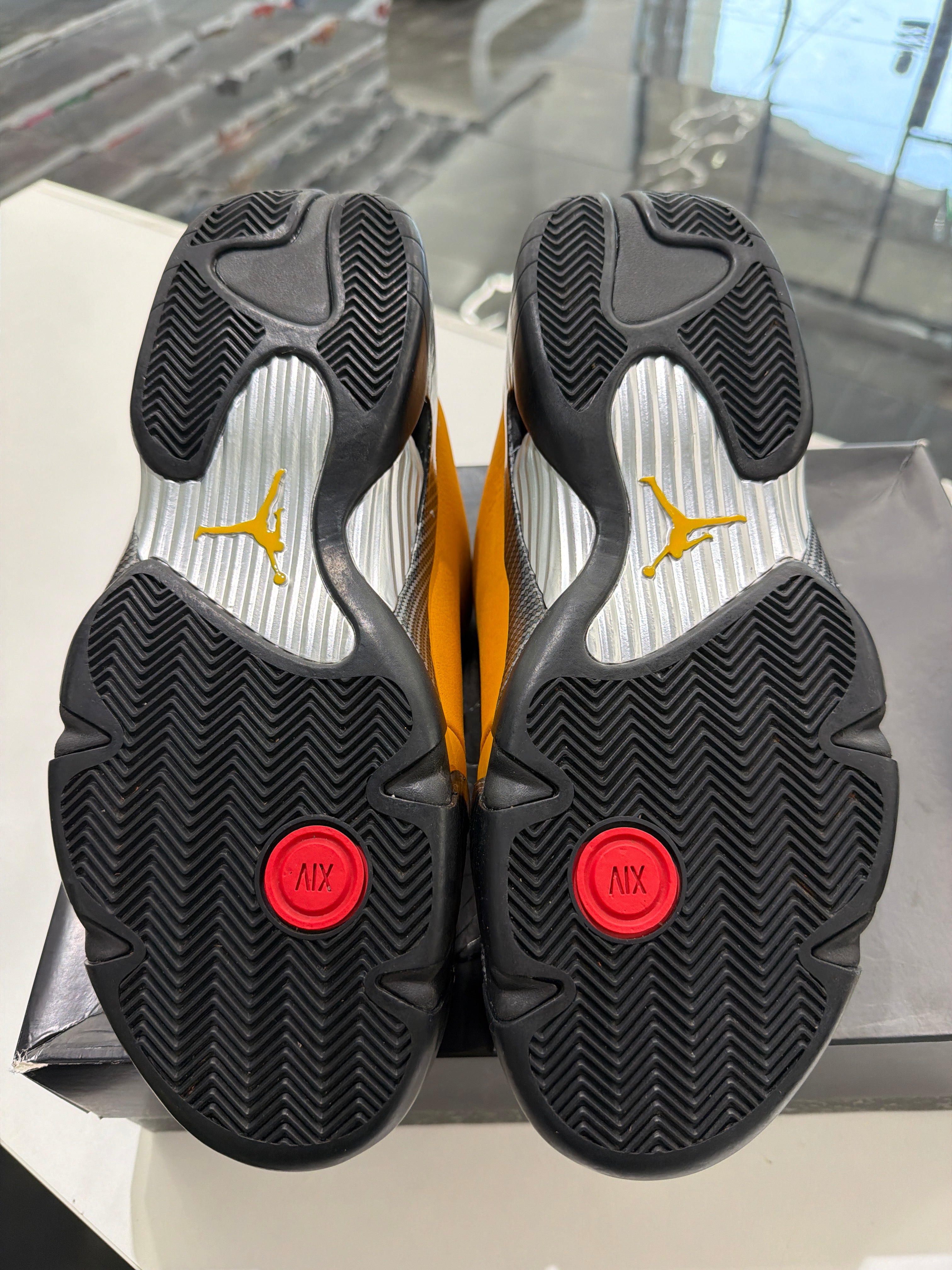 Jordan 14 university gold
