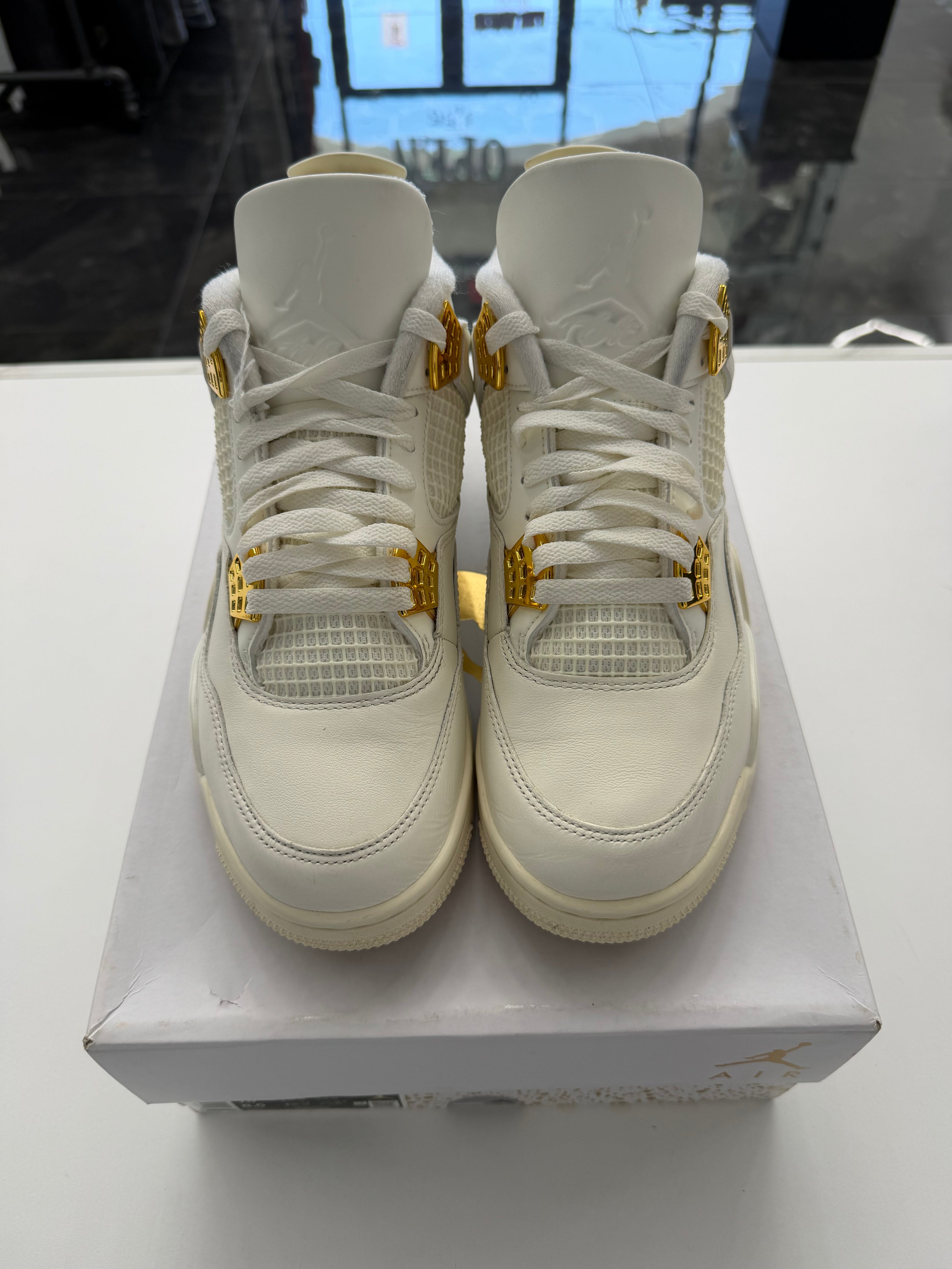 Jordan 4 Retro Metallic Gold (Women’s)