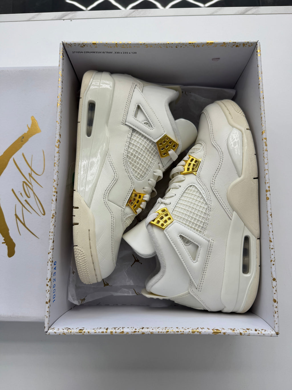Jordan 4 Retro Metallic Gold (Women’s)
