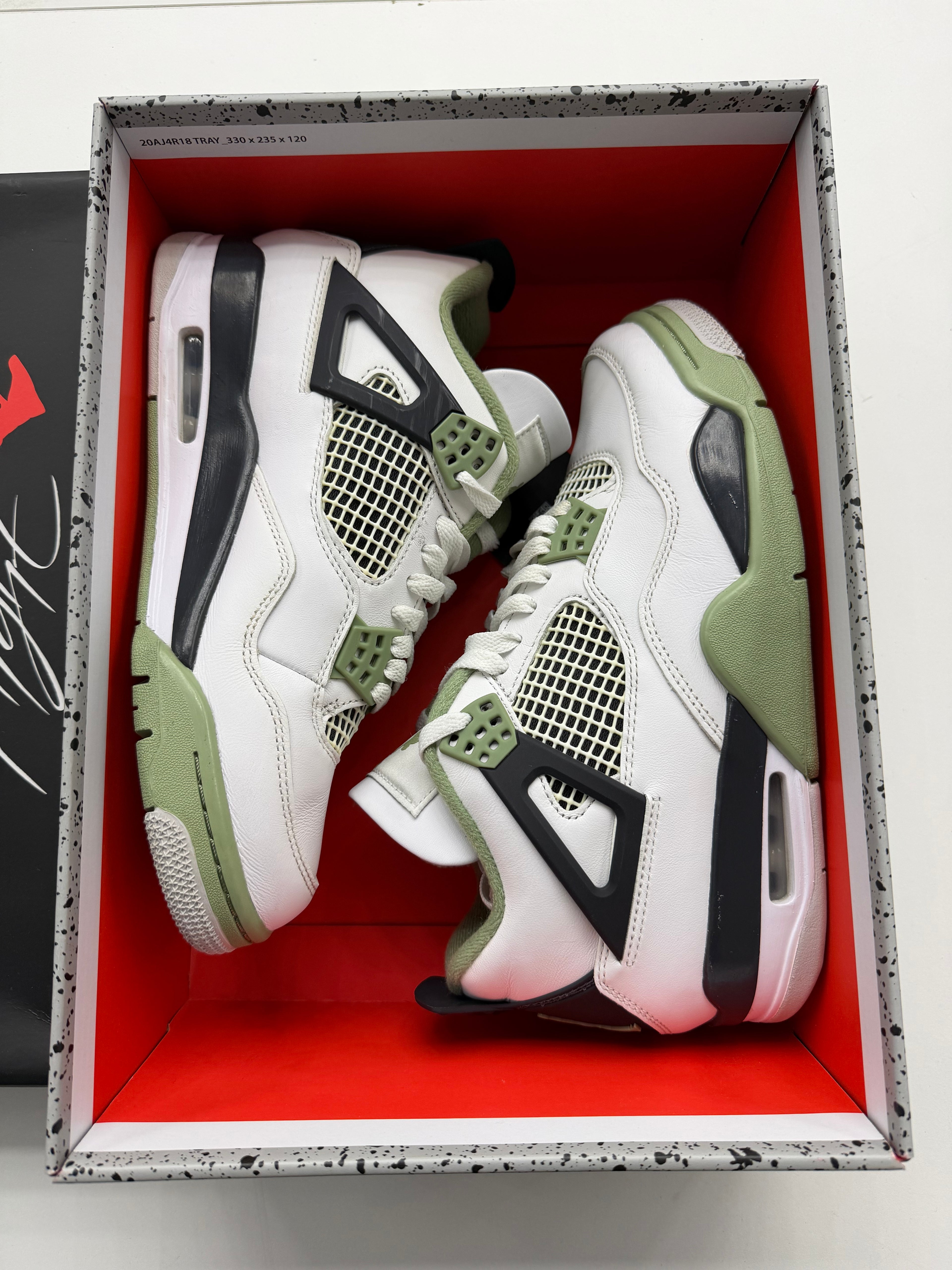 Jordan 4 Retro Seafoam (Women’s)