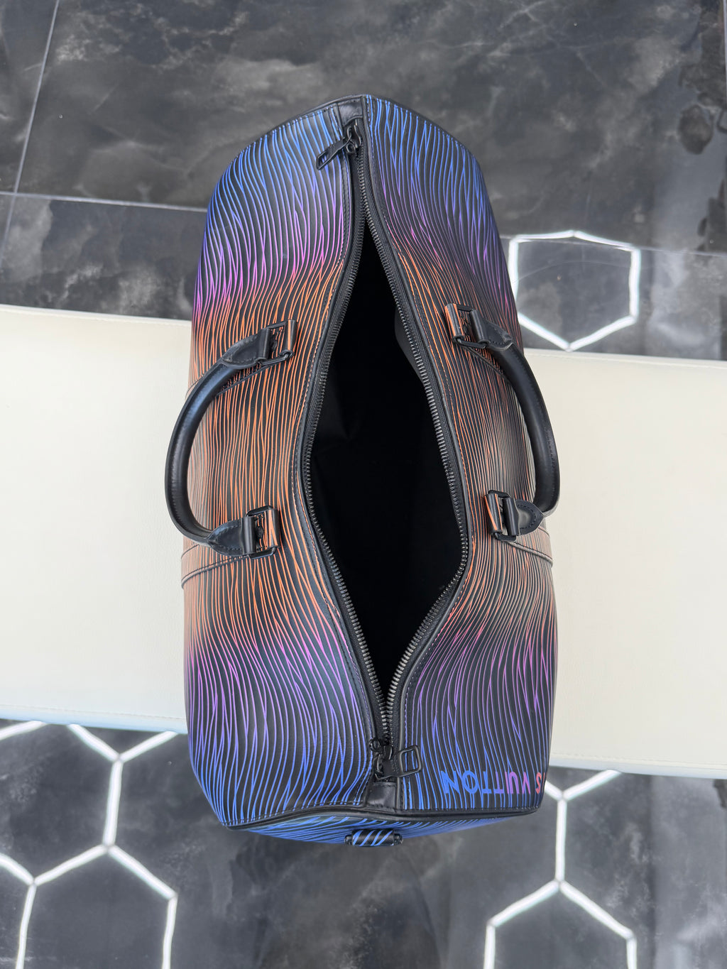 Louis Vuitton Keepall Bandouliere
50 Gradient Electric Sun