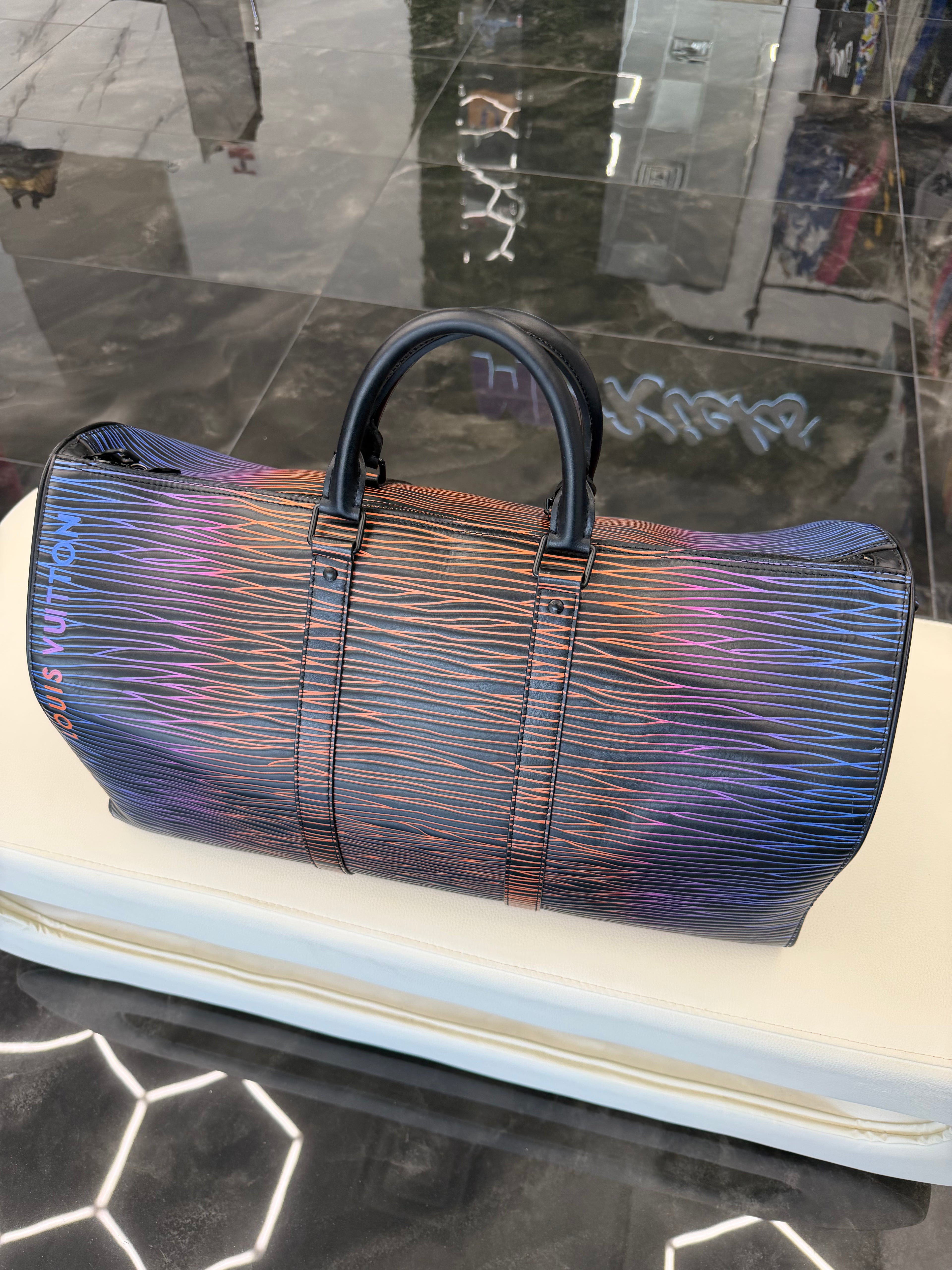 Louis Vuitton Keepall Bandouliere
50 Gradient Electric Sun
